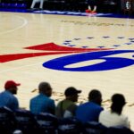 Philadelphia 76ers logo at center court before a game against the Brooklyn Nets at Wells Fargo Center.